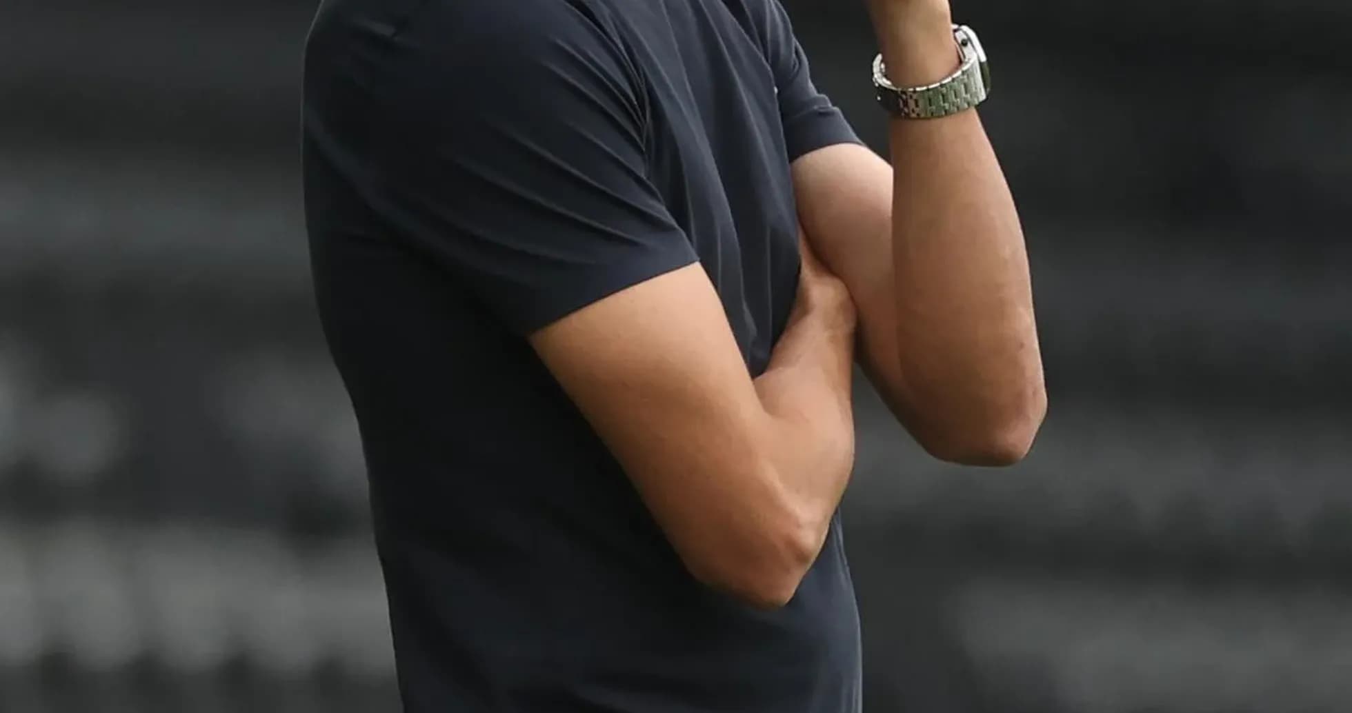 Coach observing match from the sidelines Coach observing match from the sidelines
