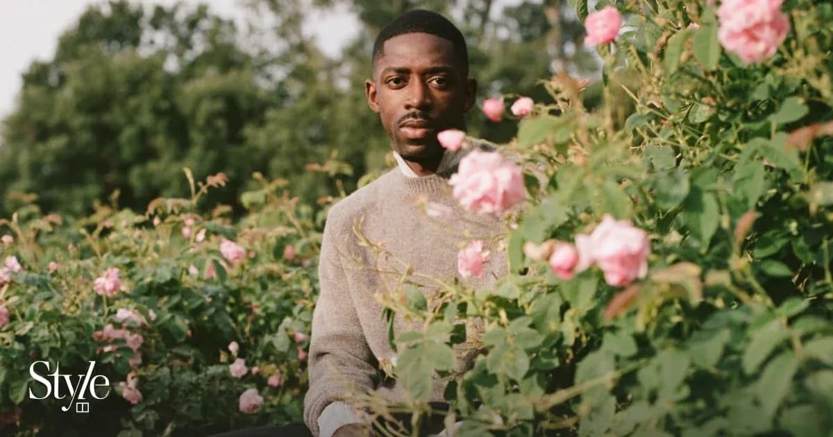 Person sitting among blooming pink roses Person sitting among blooming pink roses