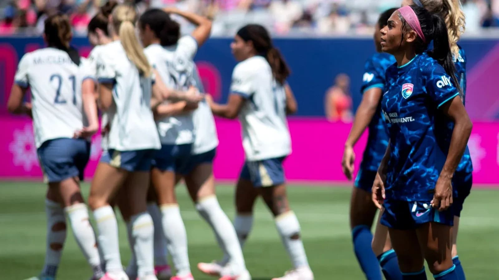 Players celebrating a goal during NWSL match Players celebrating a goal during NWSL match