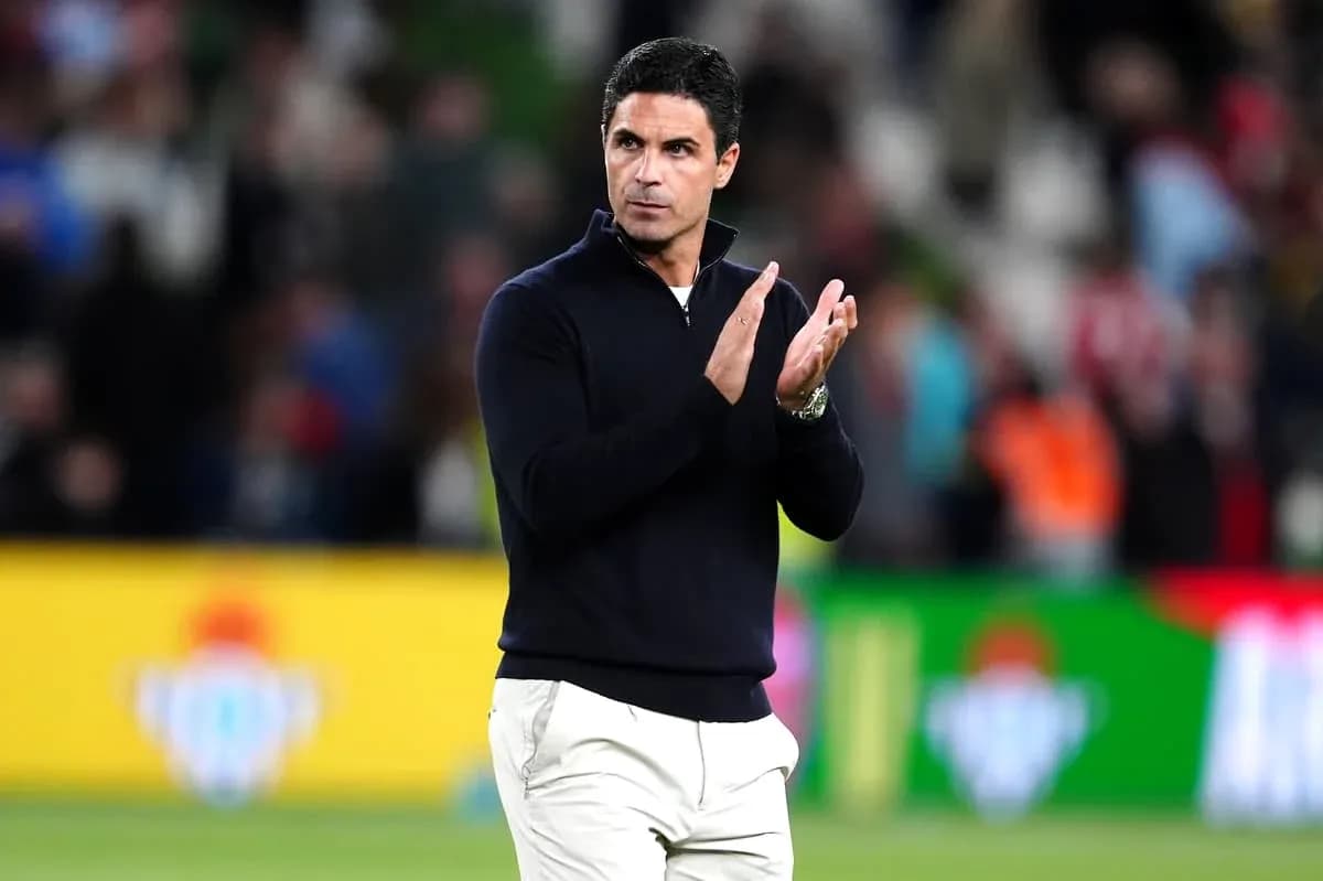 Coach applauding during a match at the stadium Coach applauding during a match at the stadium