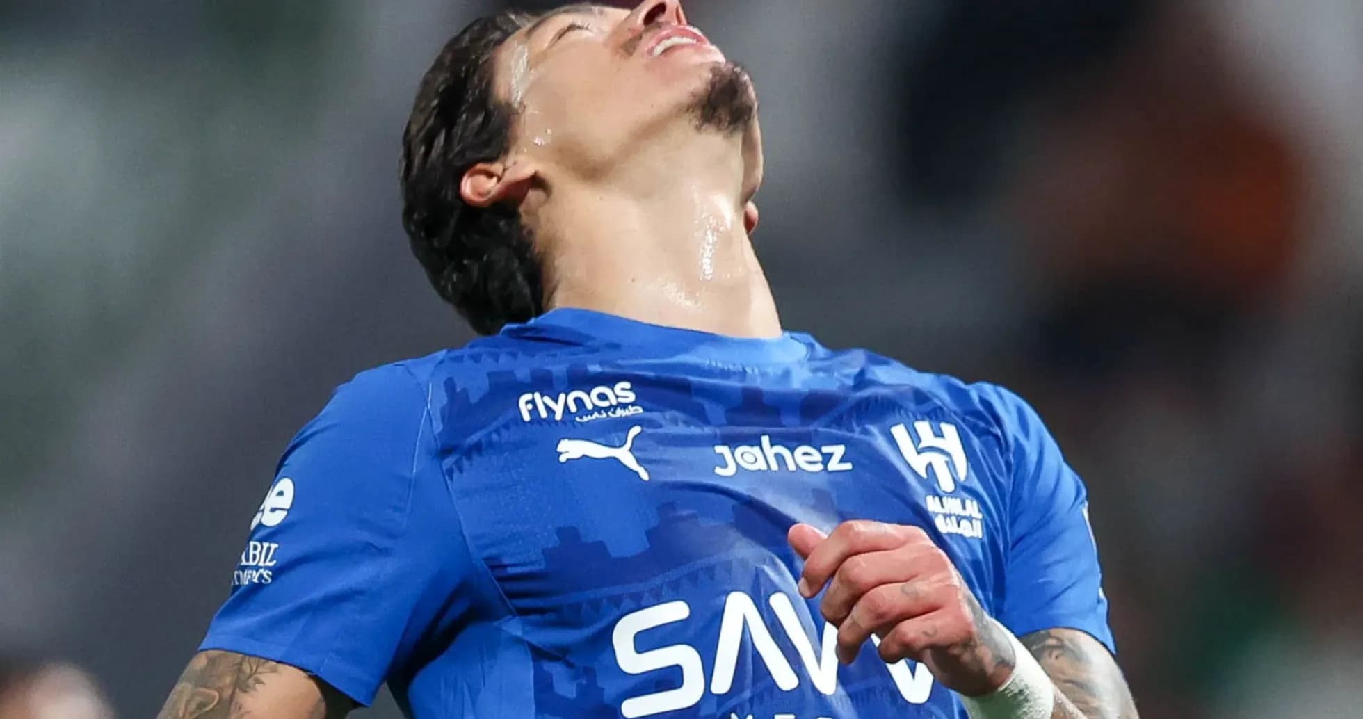 Player in blue jersey reacting during match Player in blue jersey reacting during match