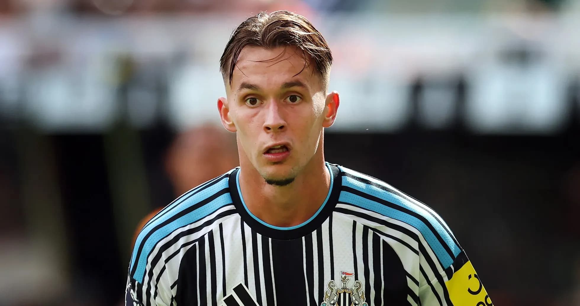 Newcastle player focused during match action Newcastle player focused during match action