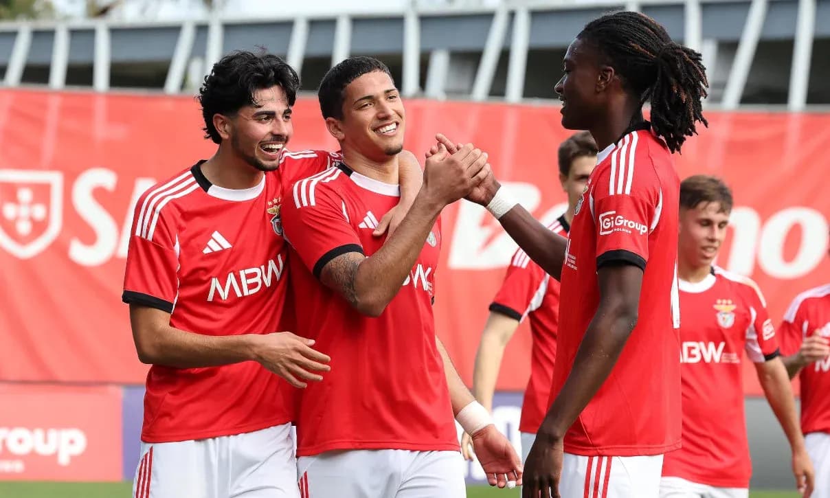 Benfica players celebrating a goal Benfica players celebrating a goal