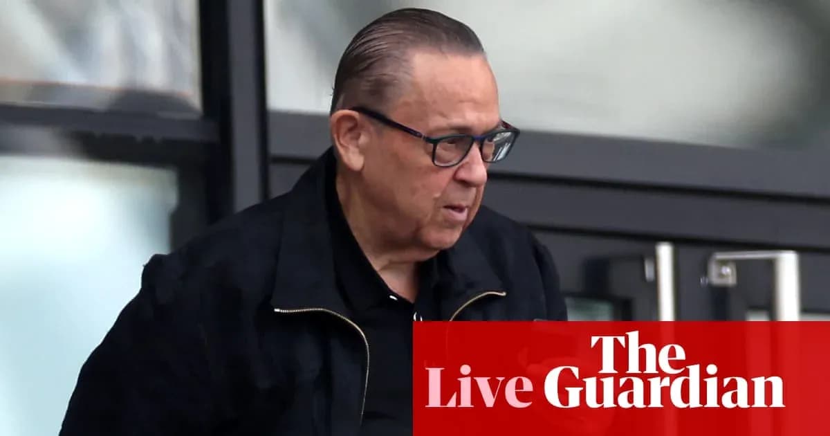 Man wearing glasses walking outside building Man wearing glasses walking outside building
