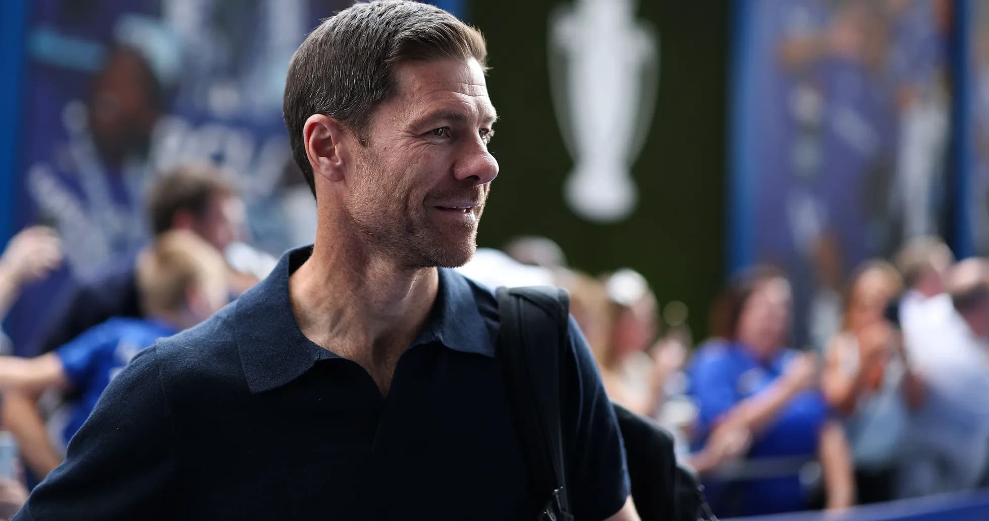 Man in a navy shirt arriving at event Man in a navy shirt arriving at event
