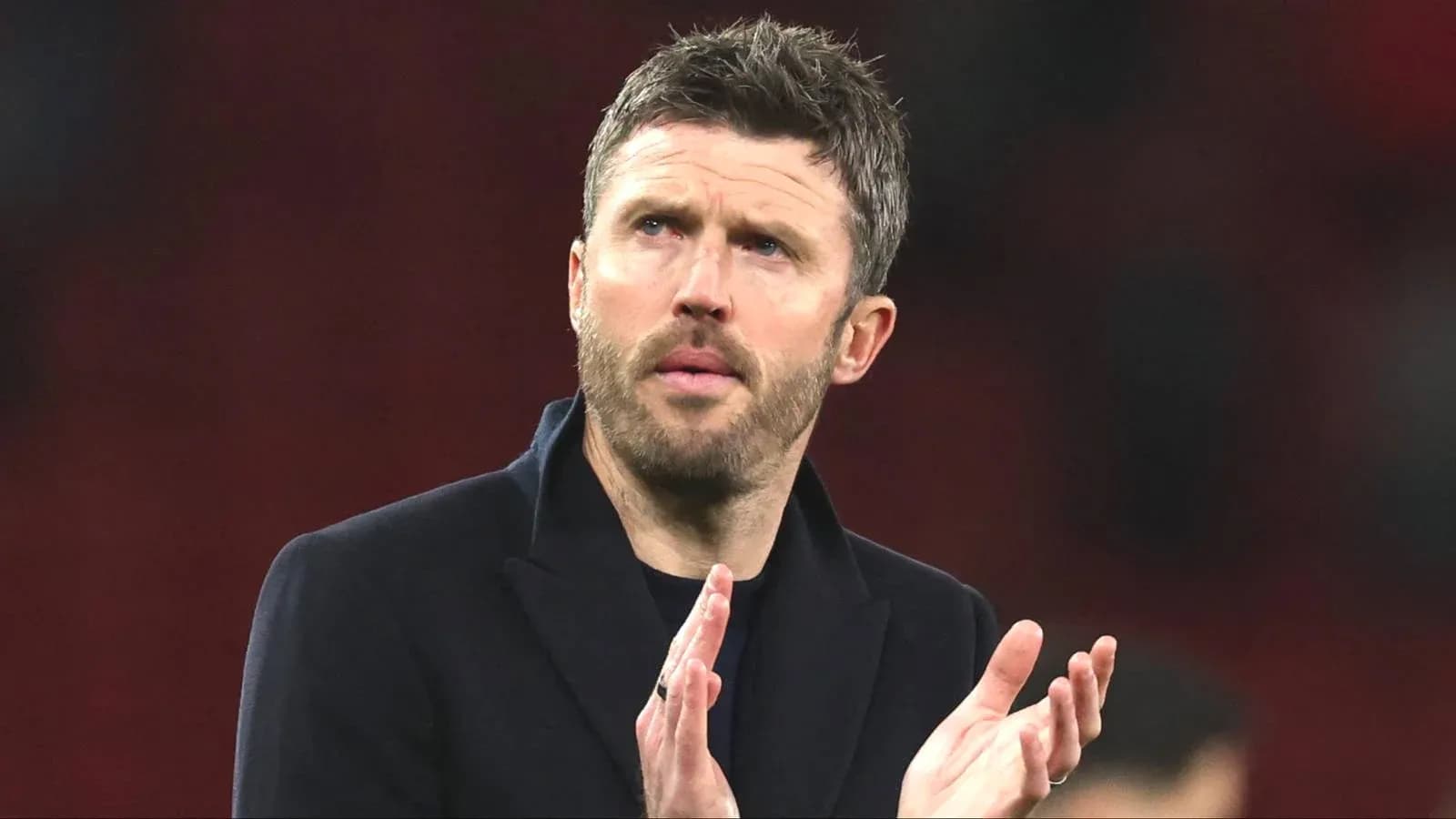 Manager applauding after match at stadium Manager applauding after match at stadium
