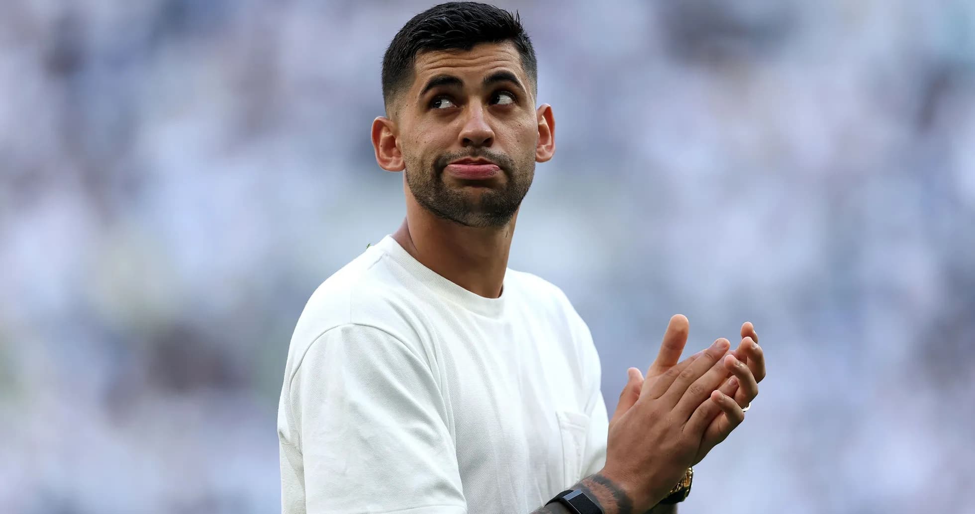 Player applauding in a stadium during match Player applauding in a stadium during match