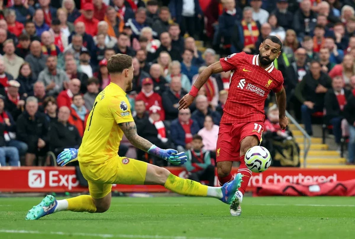 Liverpool player attempting to score against Brentford Liverpool player attempting to score against Brentford