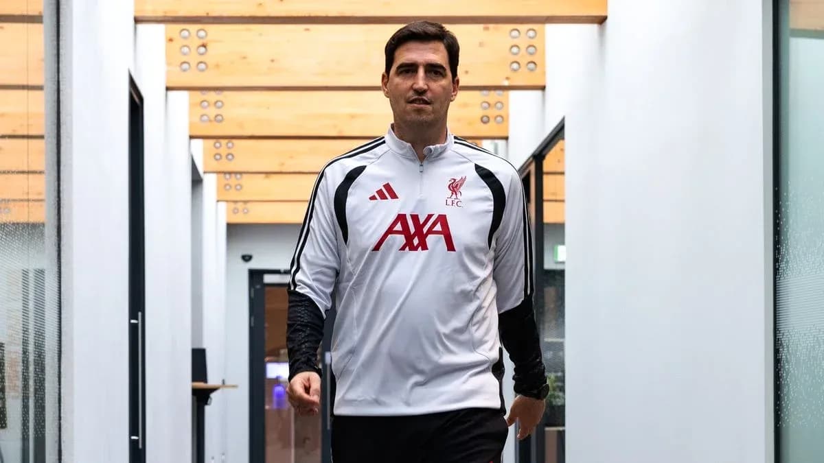 Football player walking in Liverpool training facility Football player walking in Liverpool training facility
