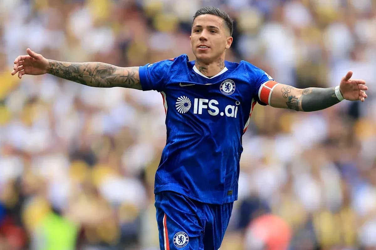 Player celebrating in Chelsea blue jersey on field Player celebrating in Chelsea blue jersey on field