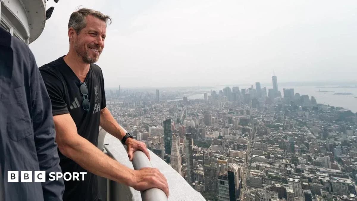 Person overlooking New York City skyline from high vantage point Person overlooking New York City skyline from high vantage point