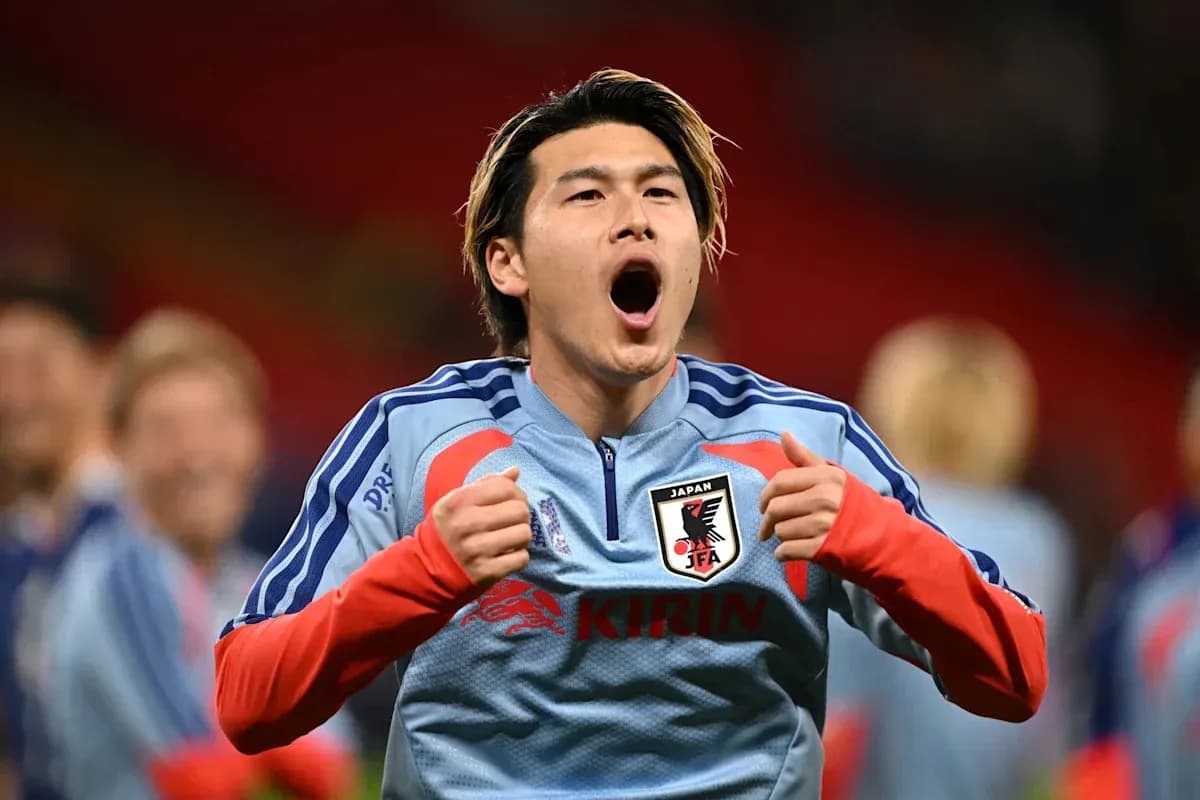 Player celebrating in Japan national team jersey Player celebrating in Japan national team jersey