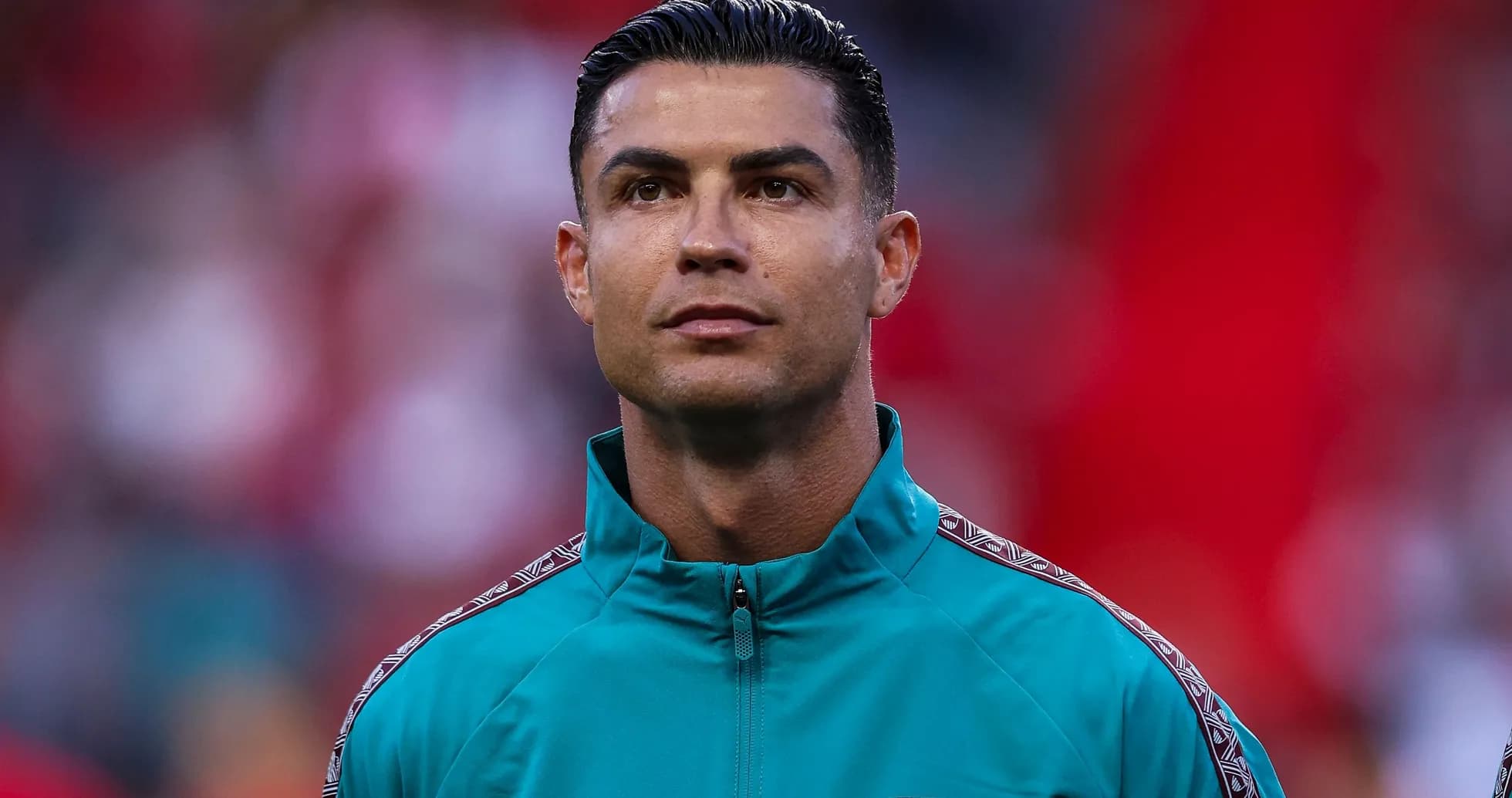 Cristiano Ronaldo wearing training jacket on field Cristiano Ronaldo wearing training jacket on field