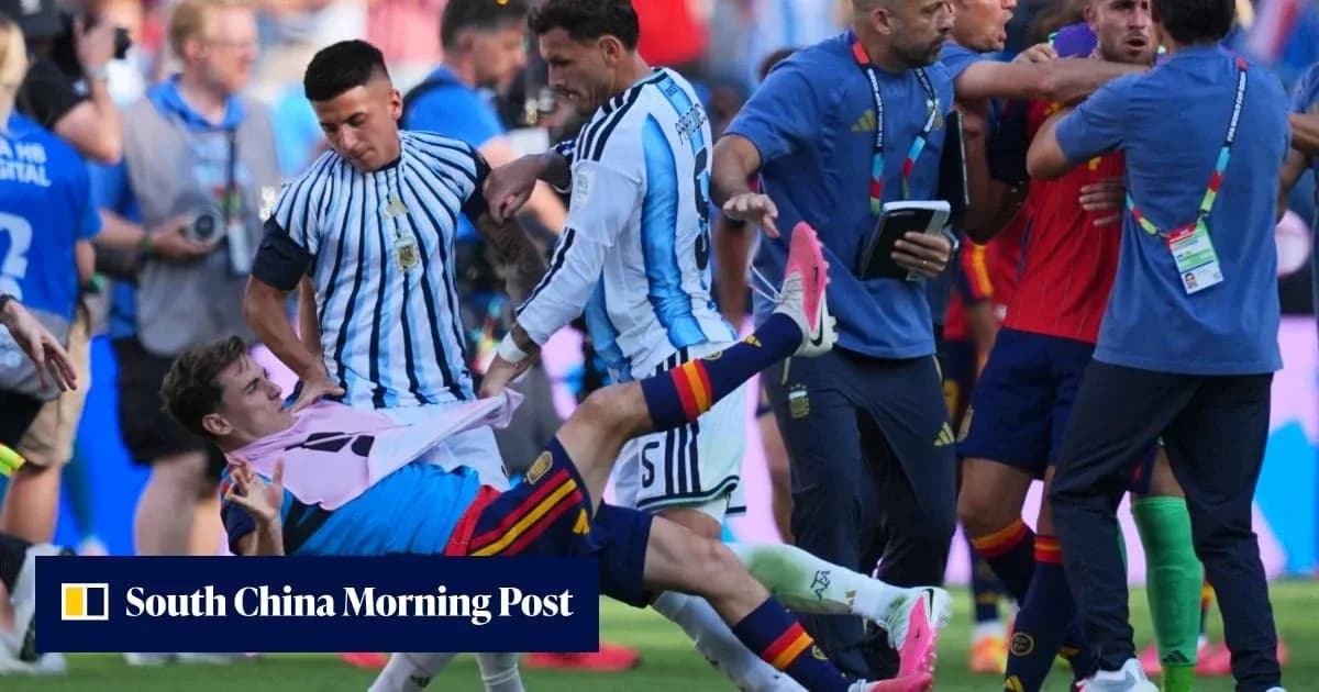 Players from Argentina and Spain in confrontation on field Players from Argentina and Spain in confrontation on field