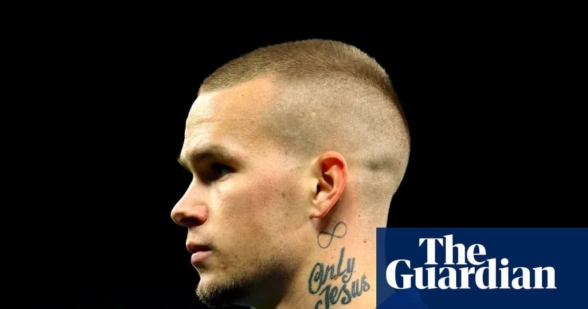 Player with short hair and neck tattoo profile Player with short hair and neck tattoo profile
