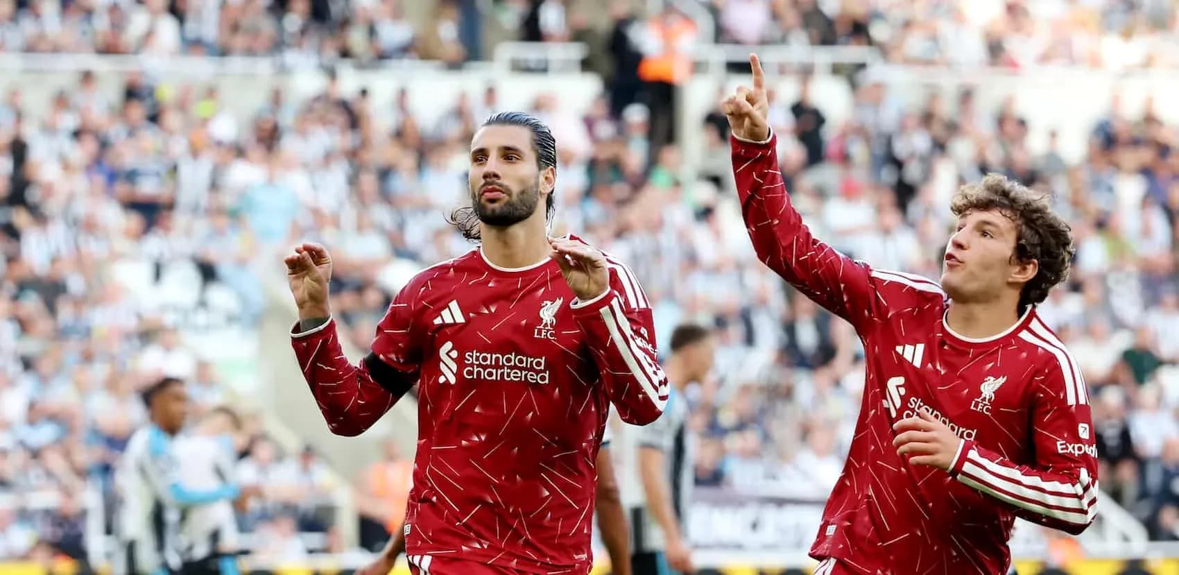 Liverpool players celebrating a goal during match Liverpool players celebrating a goal during match