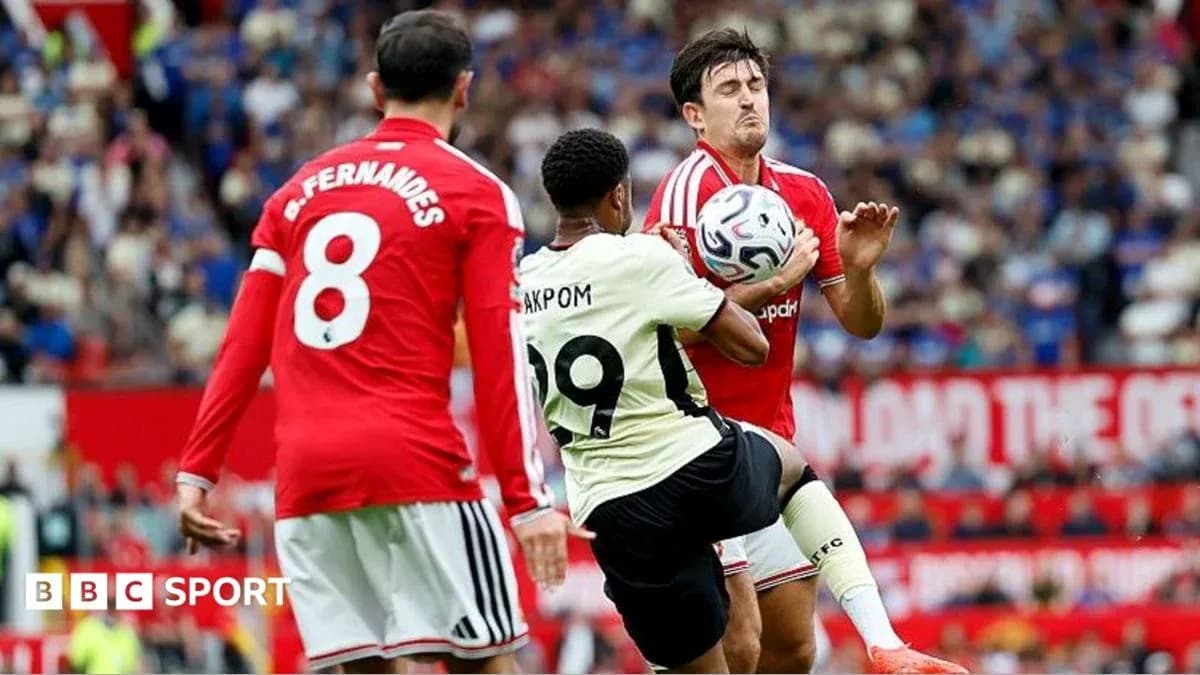 Player challenging for the ball during match action Player challenging for the ball during match action