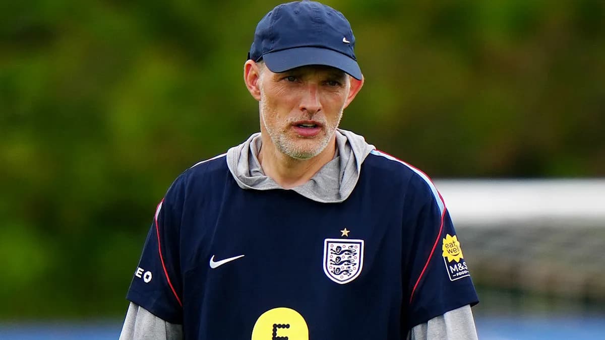 Coach wearing England training gear at practice Coach wearing England training gear at practice