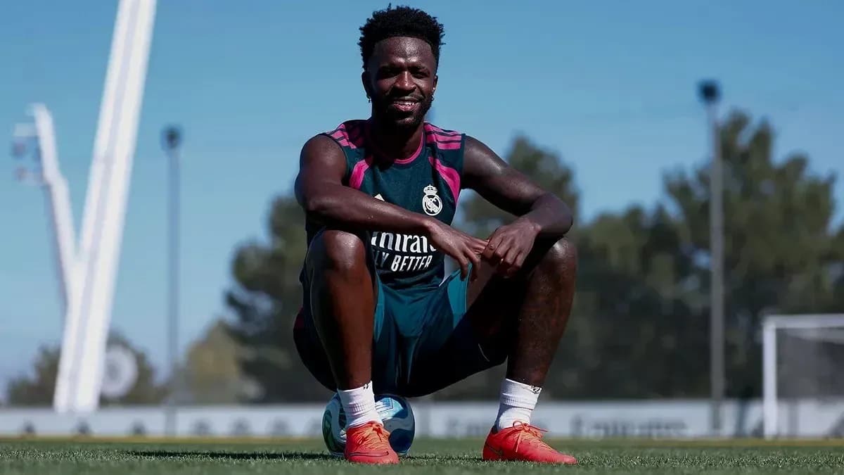 Player sitting on the ground during training session Player sitting on the ground during training session