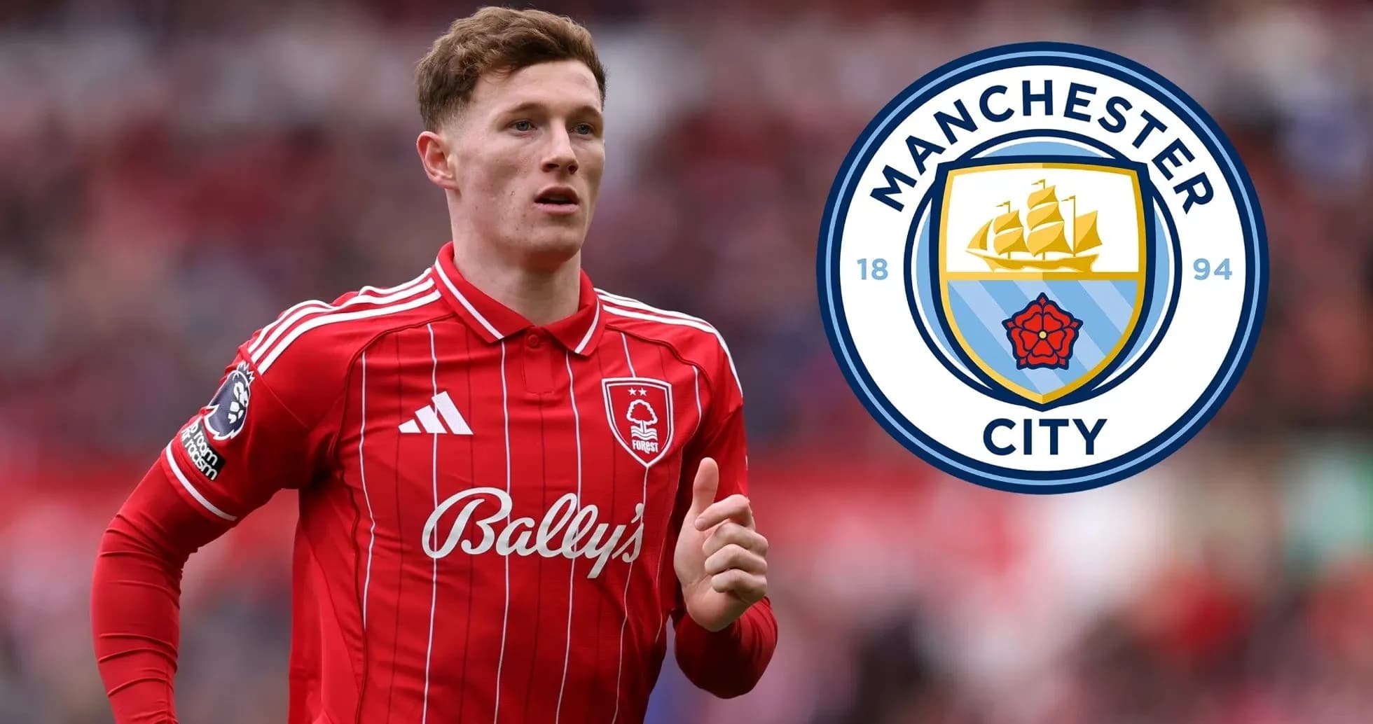 Player in red kit with Manchester City logo Player in red kit with Manchester City logo
