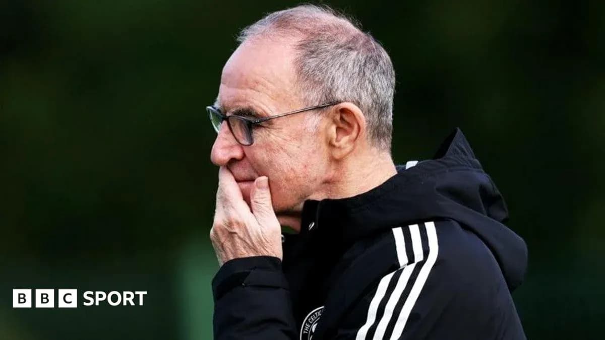 Coach observing training session with thoughtful expression Coach observing training session with thoughtful expression