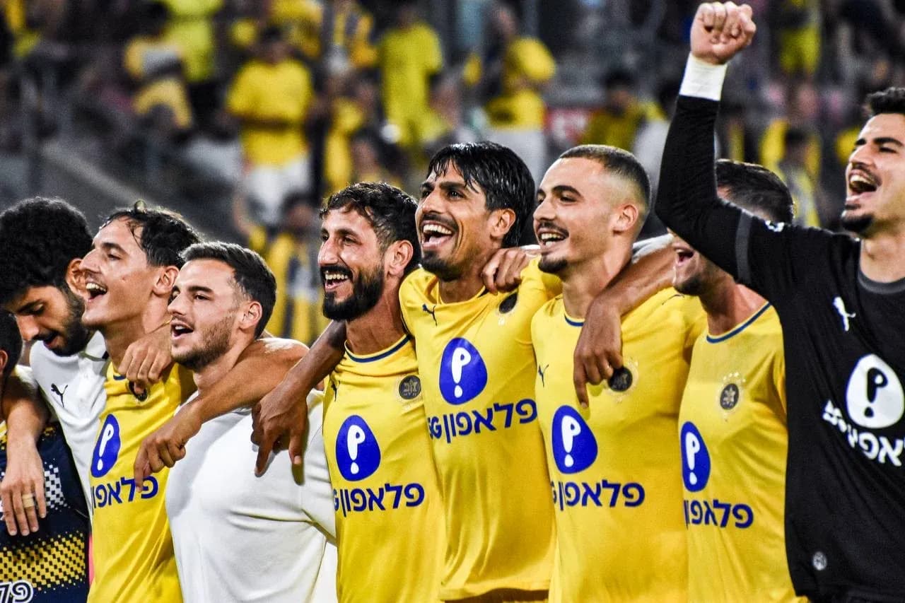 Maccabi Tel Aviv players celebrating a victory Maccabi Tel Aviv players celebrating a victory
