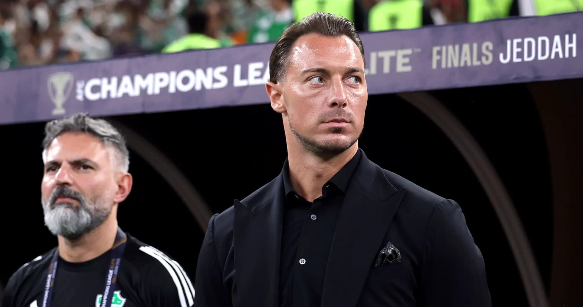 Coaches observing match during AFC Champions League final Coaches observing match during AFC Champions League final