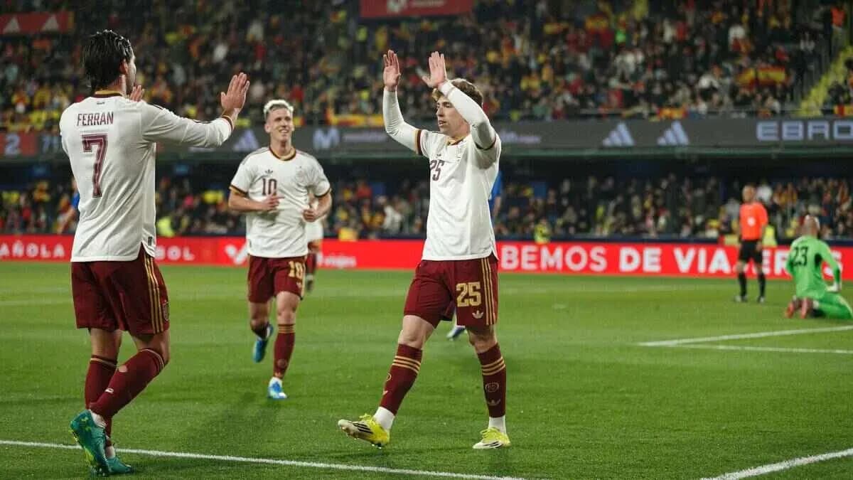 Spain players celebrating a goal during match Spain players celebrating a goal during match
