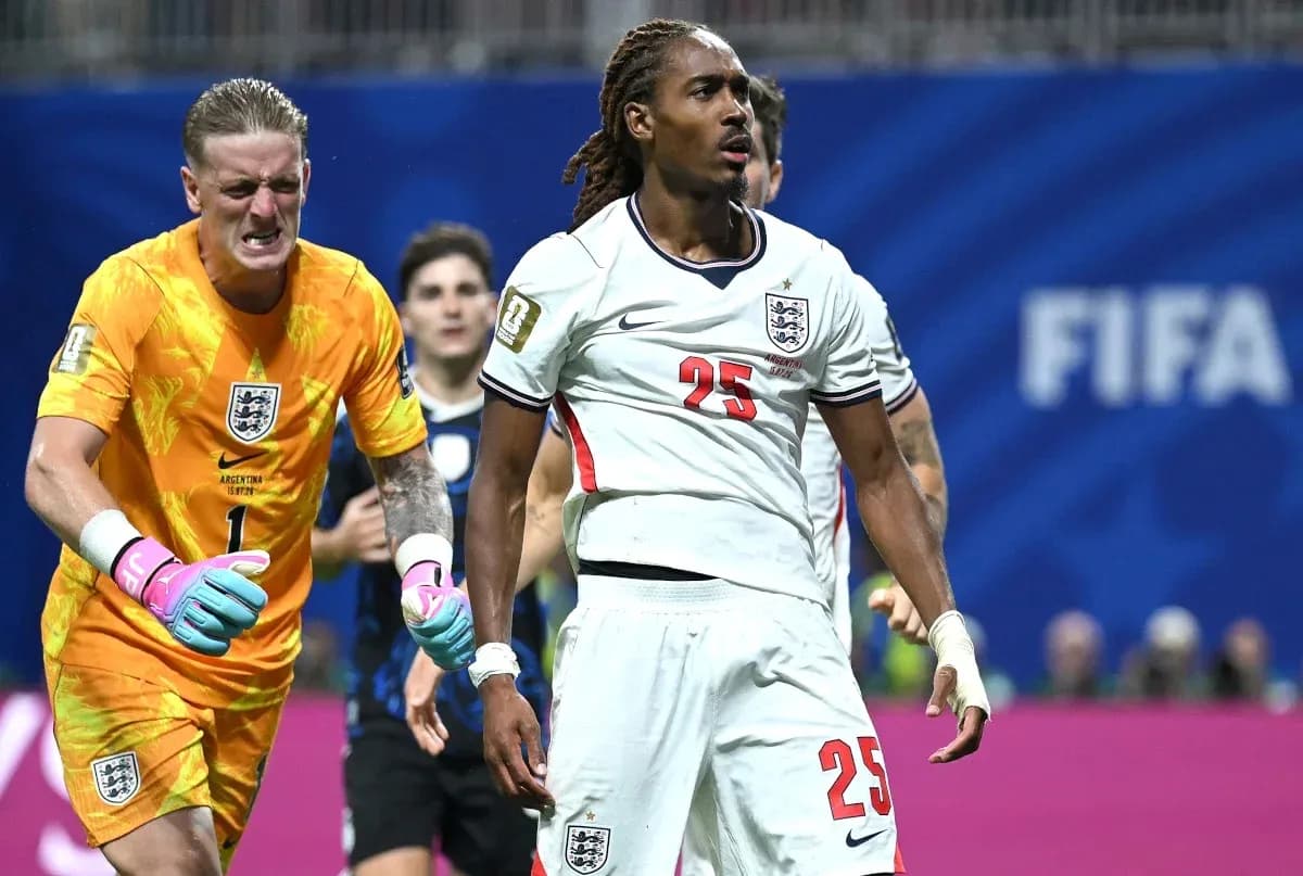 Players reacting during FIFA match with goalkeeper Players reacting during FIFA match with goalkeeper