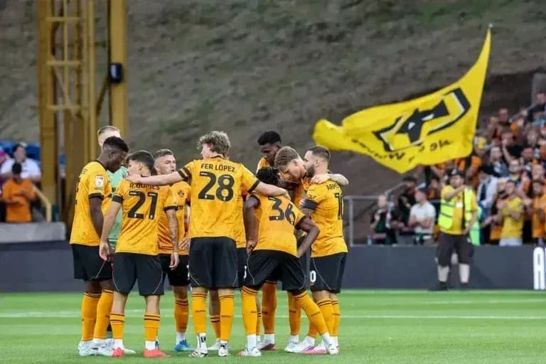 Wolverhampton players huddled before the match Wolverhampton players huddled before the match