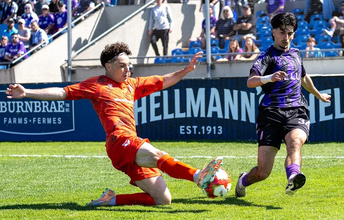 Player tackling during Forge vs Pacific FC match Player tackling during Forge vs Pacific FC match