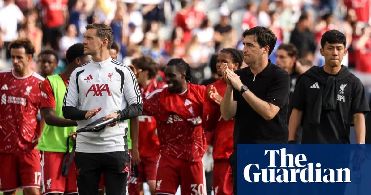 Liverpool players and staff celebrating after match Liverpool players and staff celebrating after match