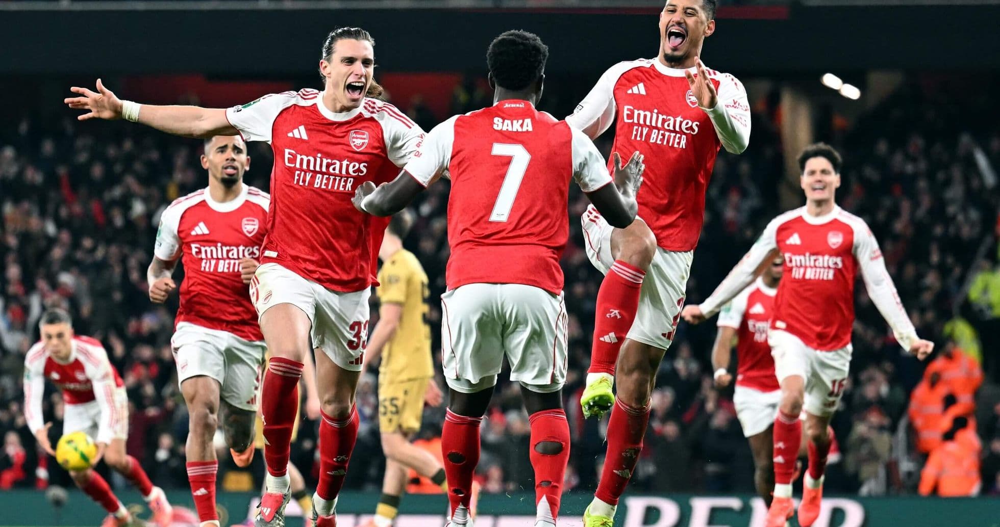 Arsenal players celebrating a goal during match Arsenal players celebrating a goal during match
