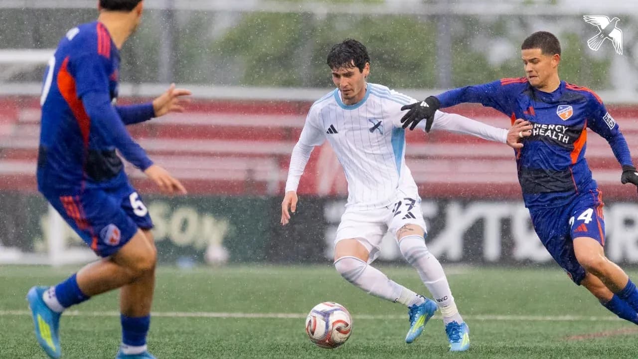 Player dribbling the ball during MLS Next Pro match Player dribbling the ball during MLS Next Pro match