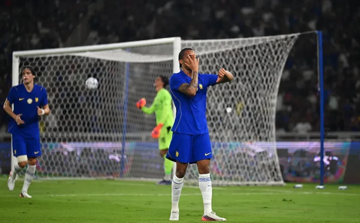 Player in blue jersey reacting during football match Player in blue jersey reacting during football match