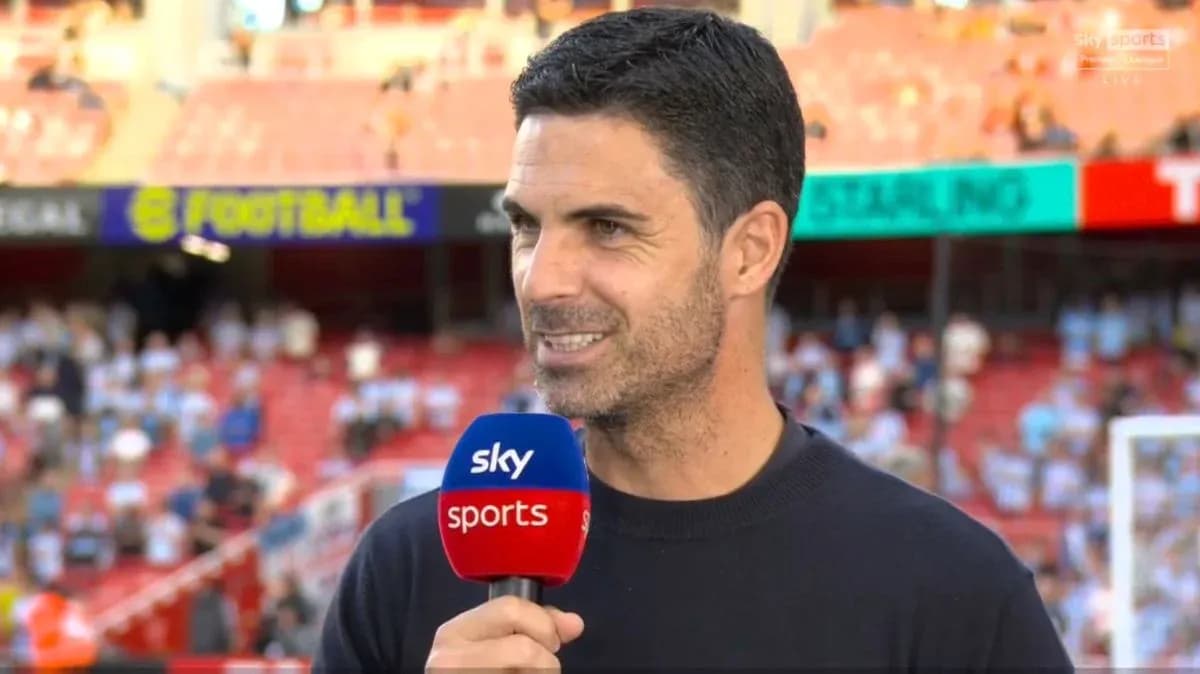 Coach speaking during pre-match interview on set Coach speaking during pre-match interview on set