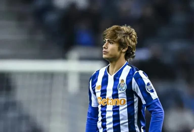 Player in FC Porto jersey on the pitch Player in FC Porto jersey on the pitch