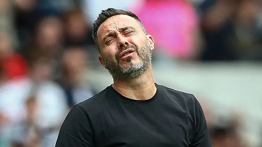 Coach reacting during a tense moment in match Coach reacting during a tense moment in match