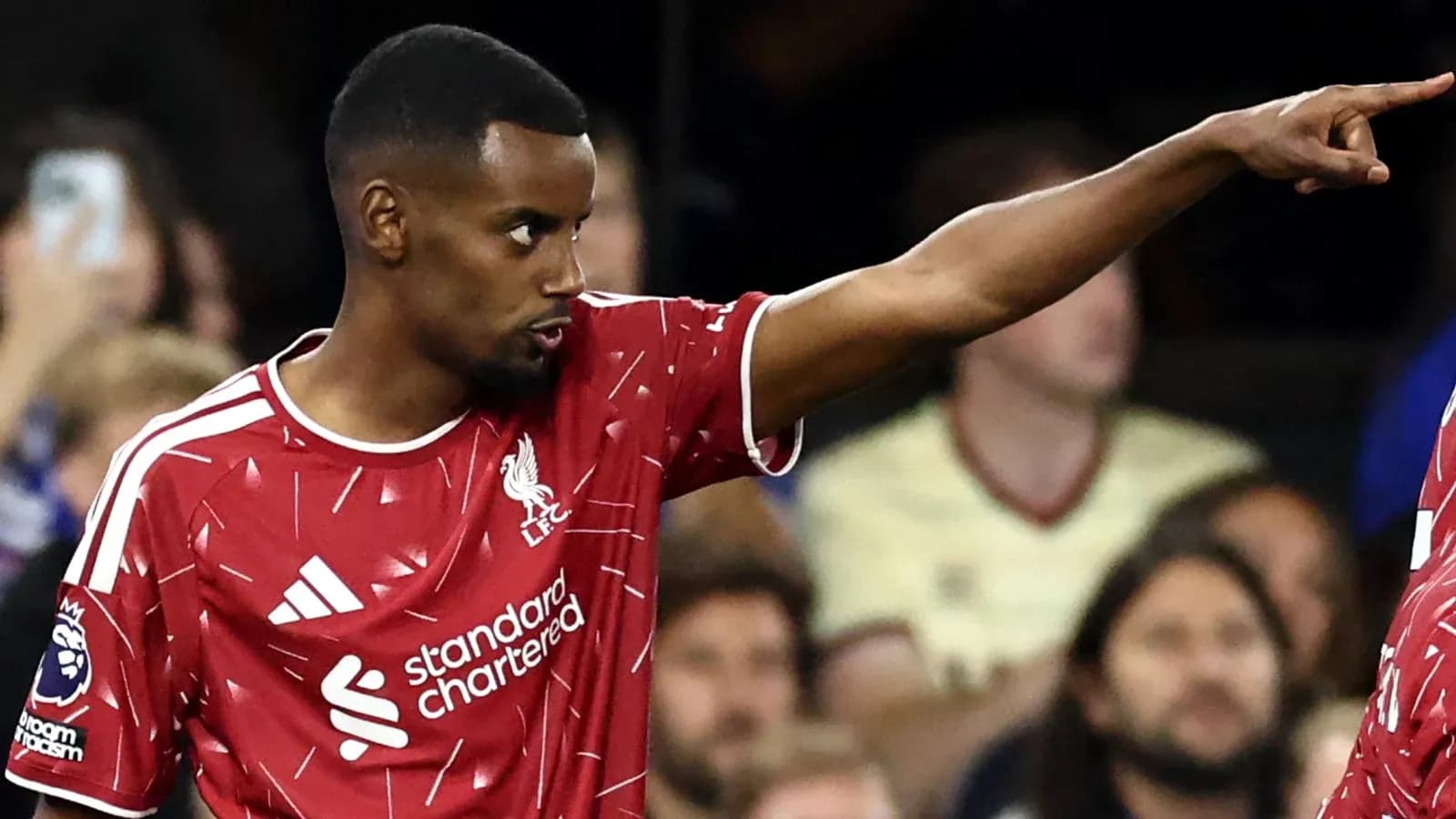 Player gesturing during Liverpool match action Player gesturing during Liverpool match action