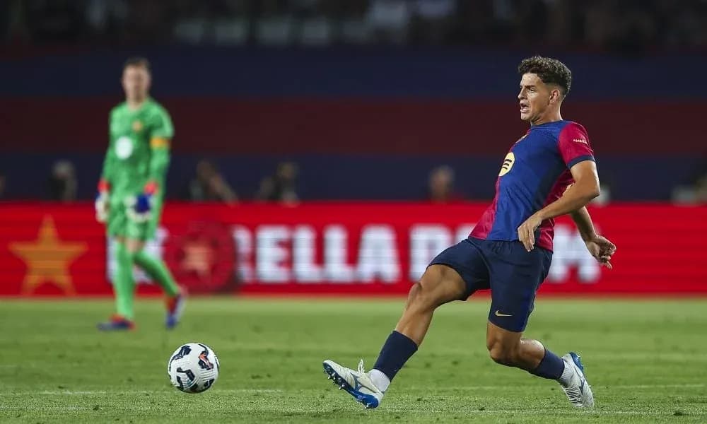 Player executing a kick on the field during match Player executing a kick on the field during match