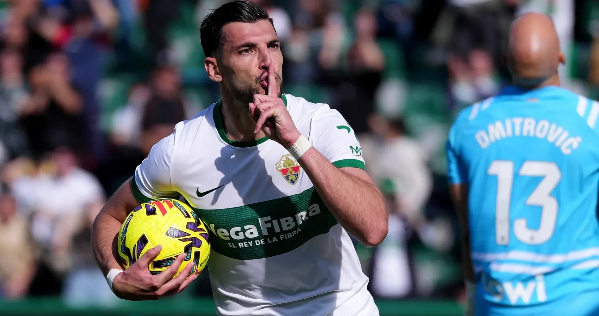 Elche player celebrating with the ball Elche player celebrating with the ball