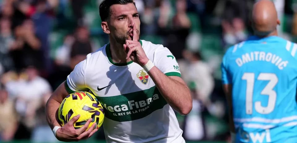 Elche player celebrating with the ball Elche player celebrating with the ball