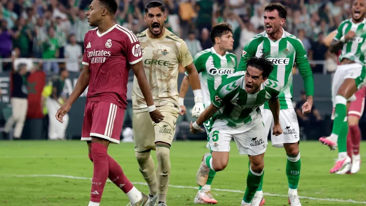 Real Betis players celebrating a goal against Real Madrid Real Betis players celebrating a goal against Real Madrid