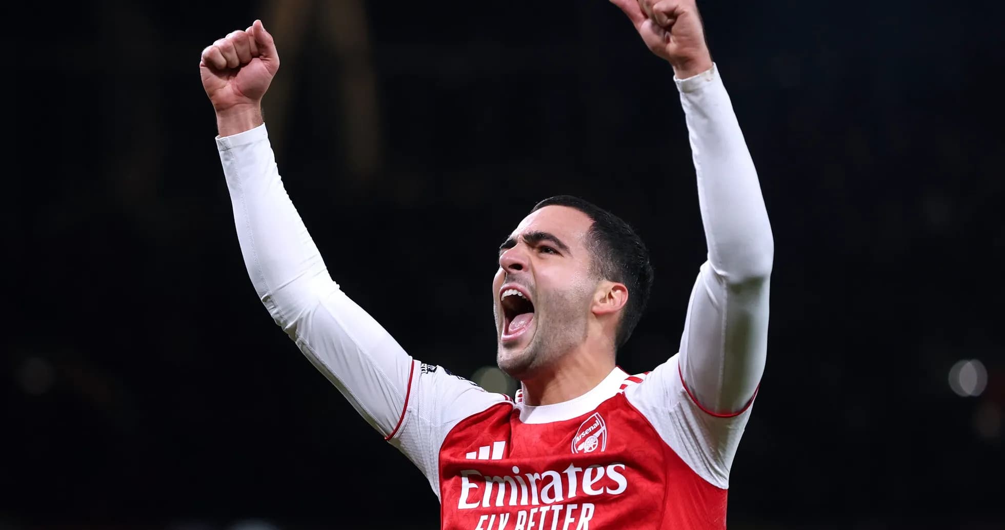 Player celebrating victory with raised fists Player celebrating victory with raised fists