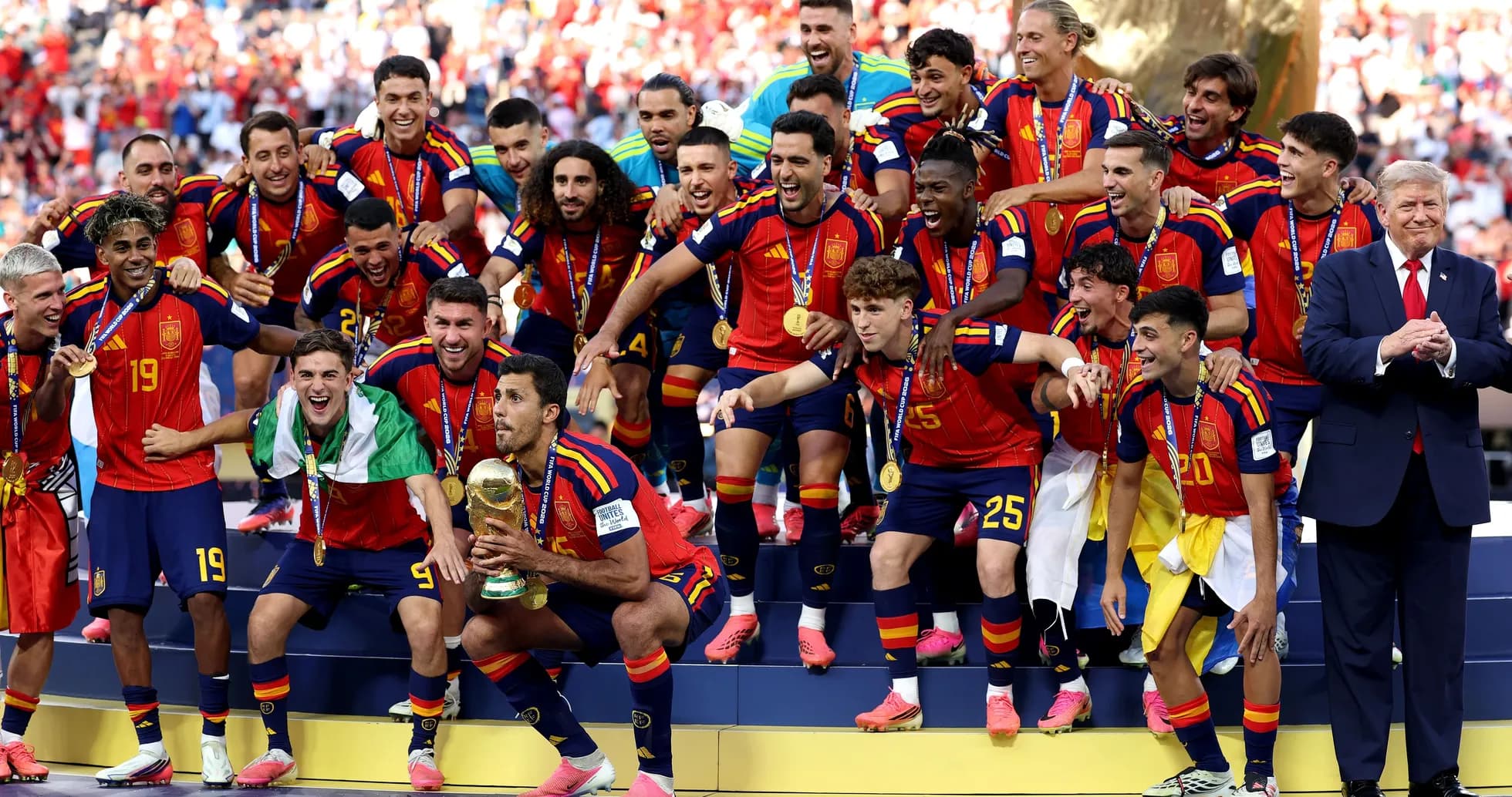 Spain team celebrating with trophy after winning tournament Spain team celebrating with trophy after winning tournament
