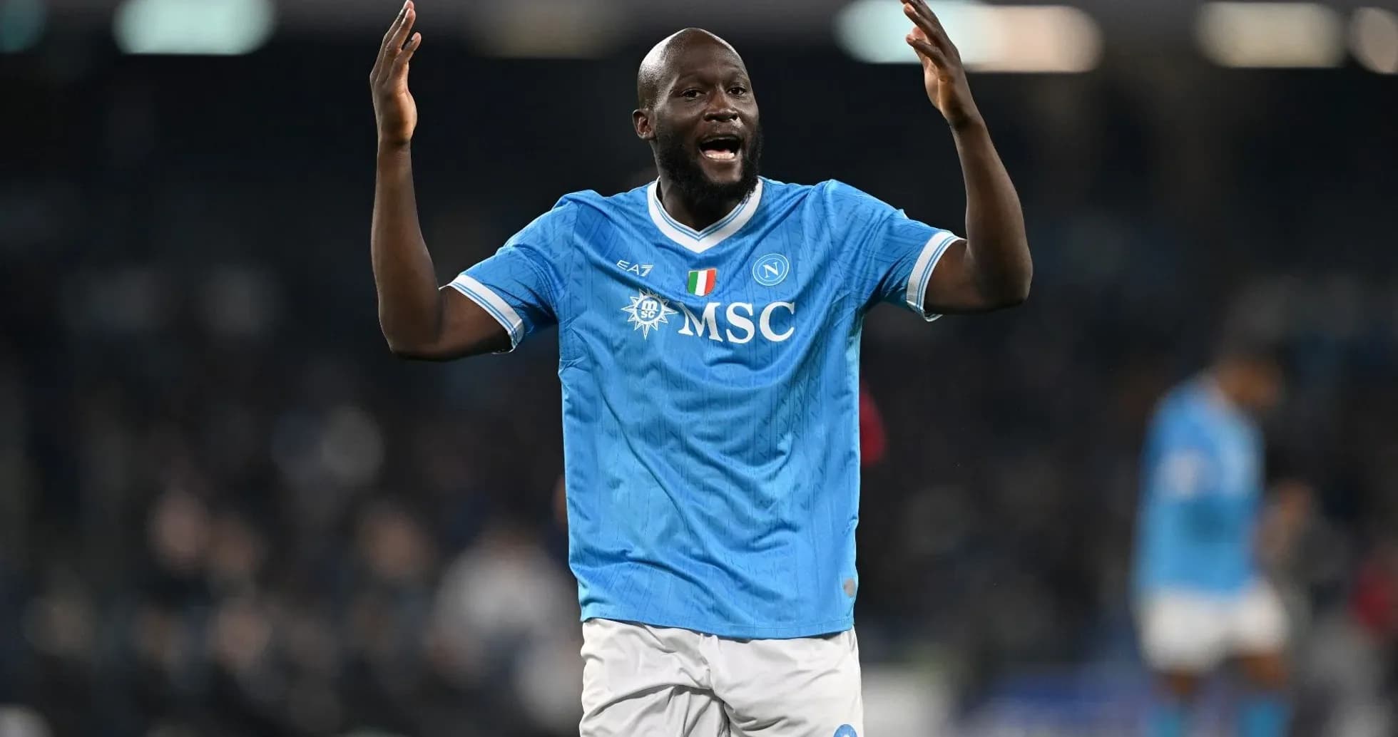 Player celebrating in Napoli home jersey during match Player celebrating in Napoli home jersey during match