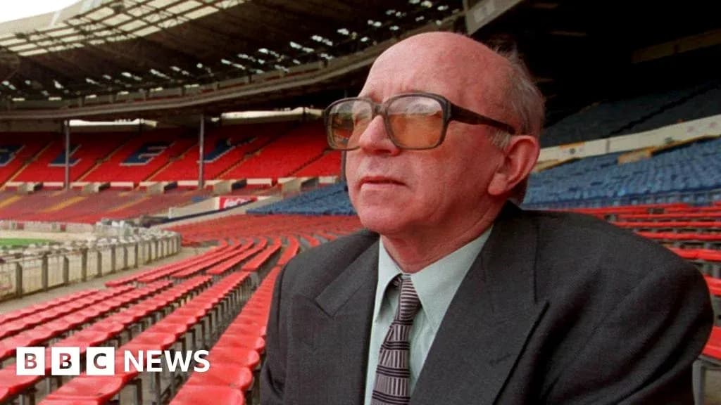 Person seated in empty stadium stands Person seated in empty stadium stands