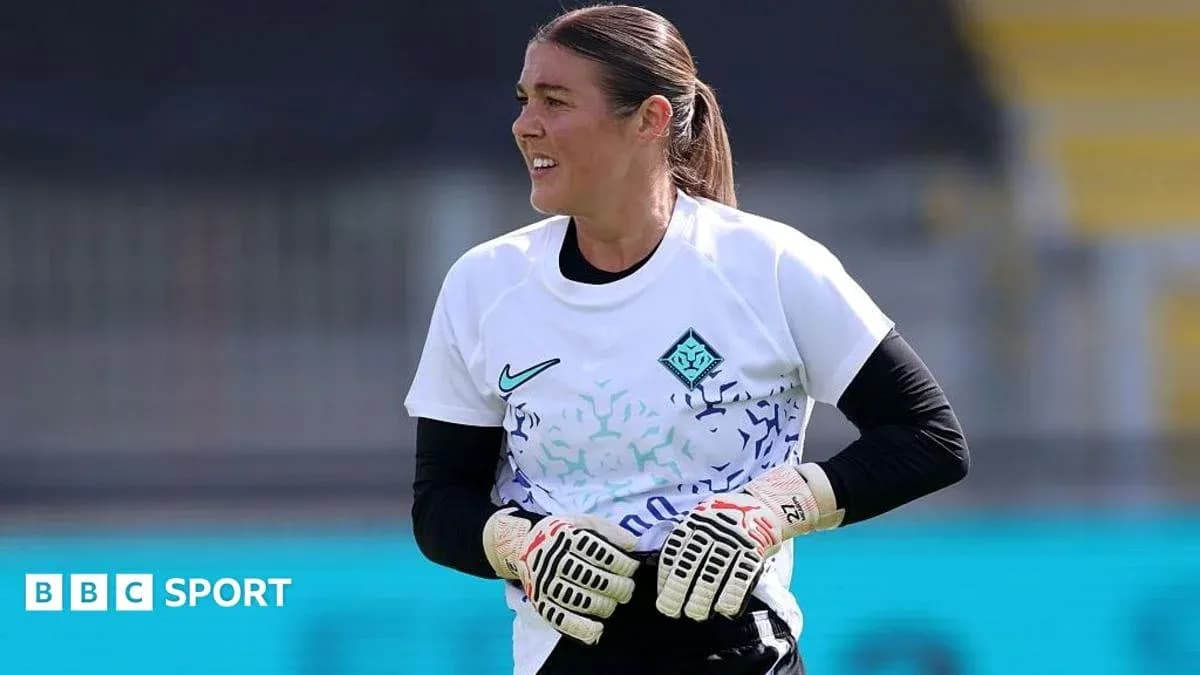 Goalkeeper in training gear preparing for practice Goalkeeper in training gear preparing for practice