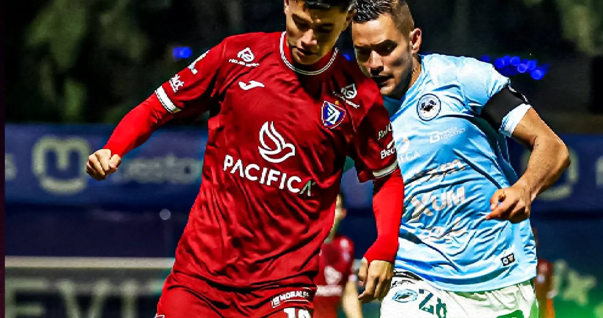 Two players competing during Liga de Expansión MX match Two players competing during Liga de Expansión MX match