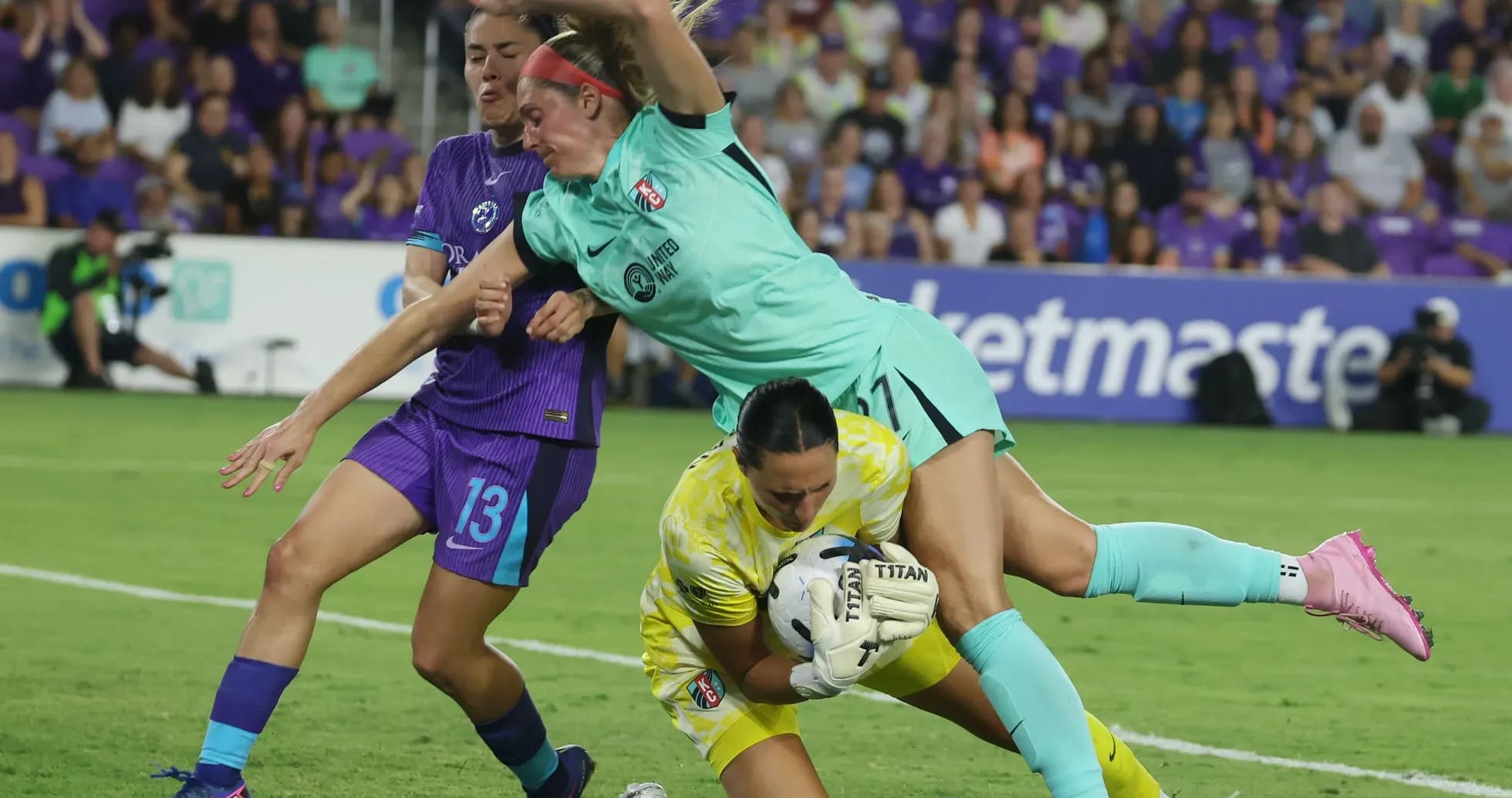 Goalkeeper making a save during NWSL match Goalkeeper making a save during NWSL match